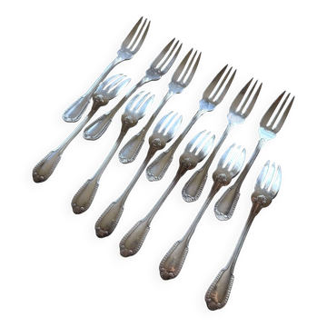 Série de 12 fourchettes à dessert, modèle godrons