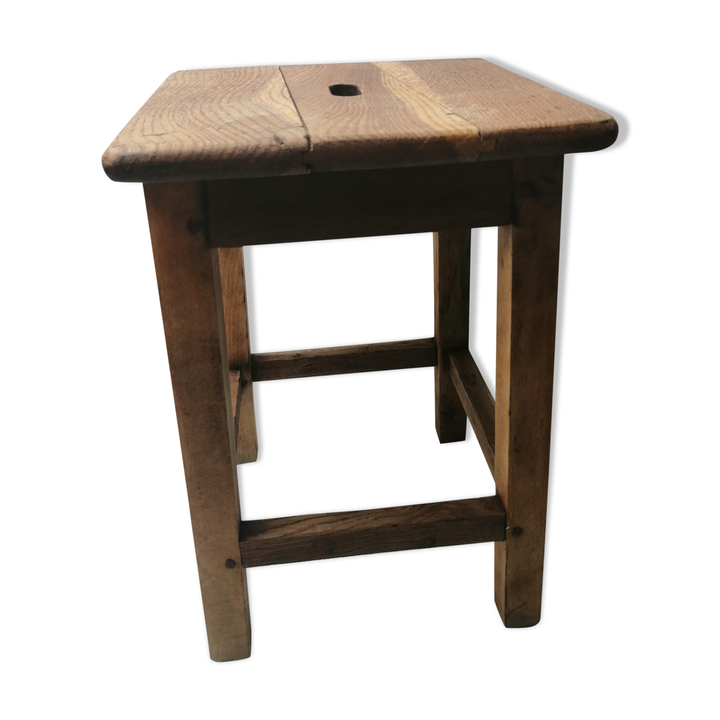 Old farm or workshop stool in oak
