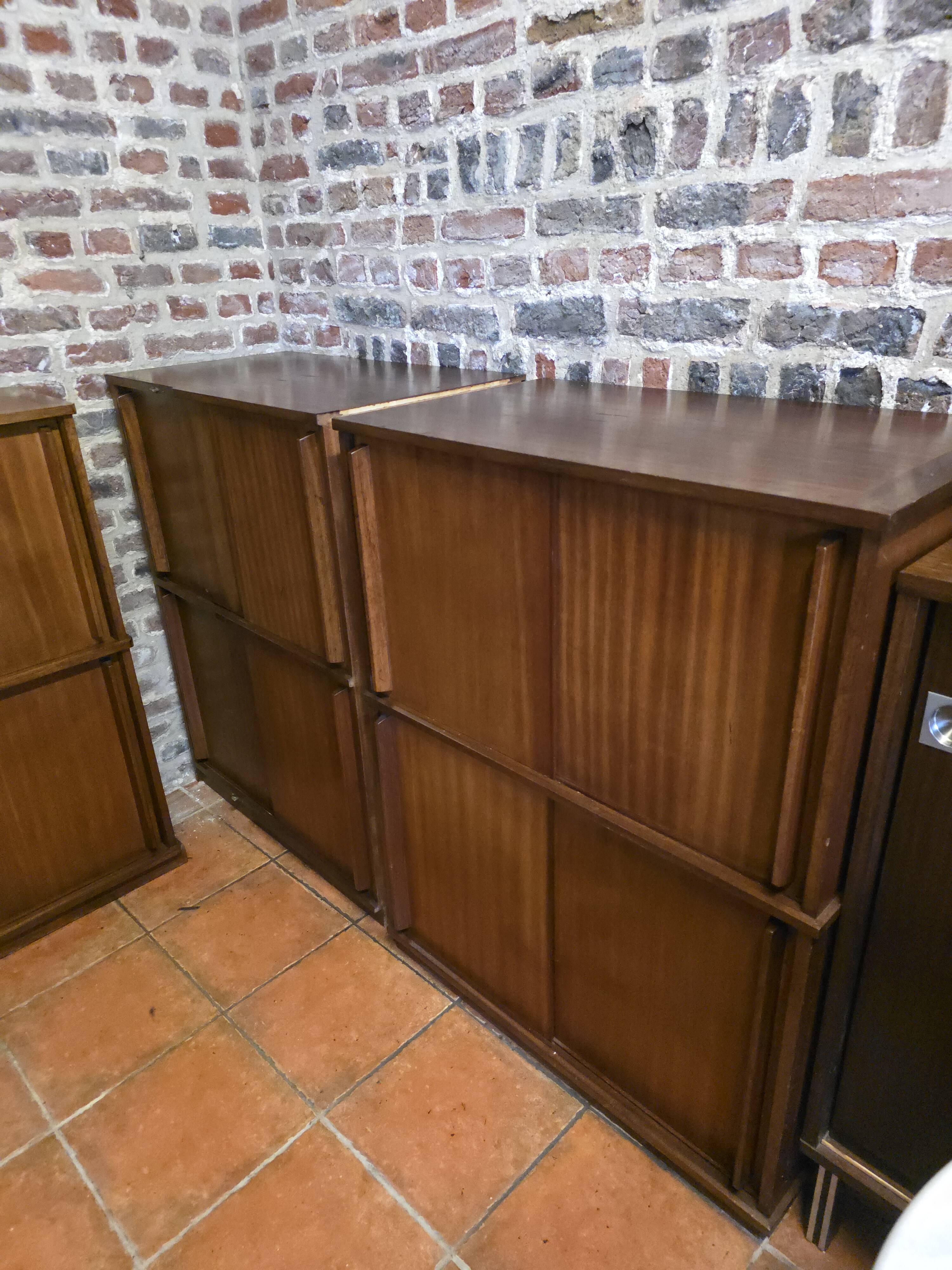 Modular corner library Oscar from the 1960s with sliding doors.