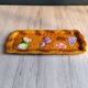 Vintage barbotine pocket dish from Salins les Bains, relief decoration of fruits.