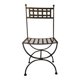 Worn silver wrought iron chair