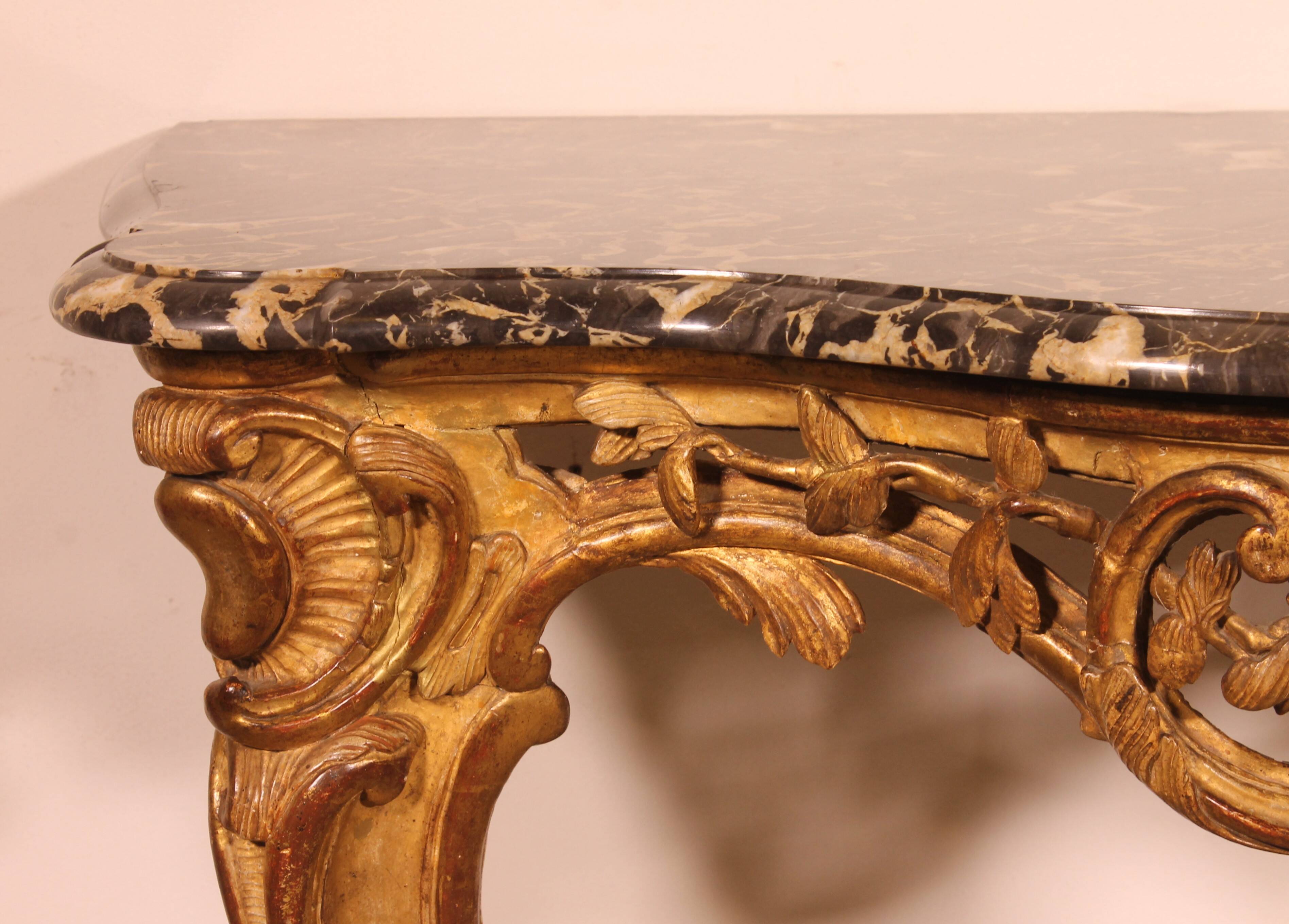 Louis XV period console in gilded wood