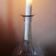 Glass carafe with round neck and fluted bellies