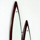 Italian sculptural wall mirror in wood from the 1960s.
