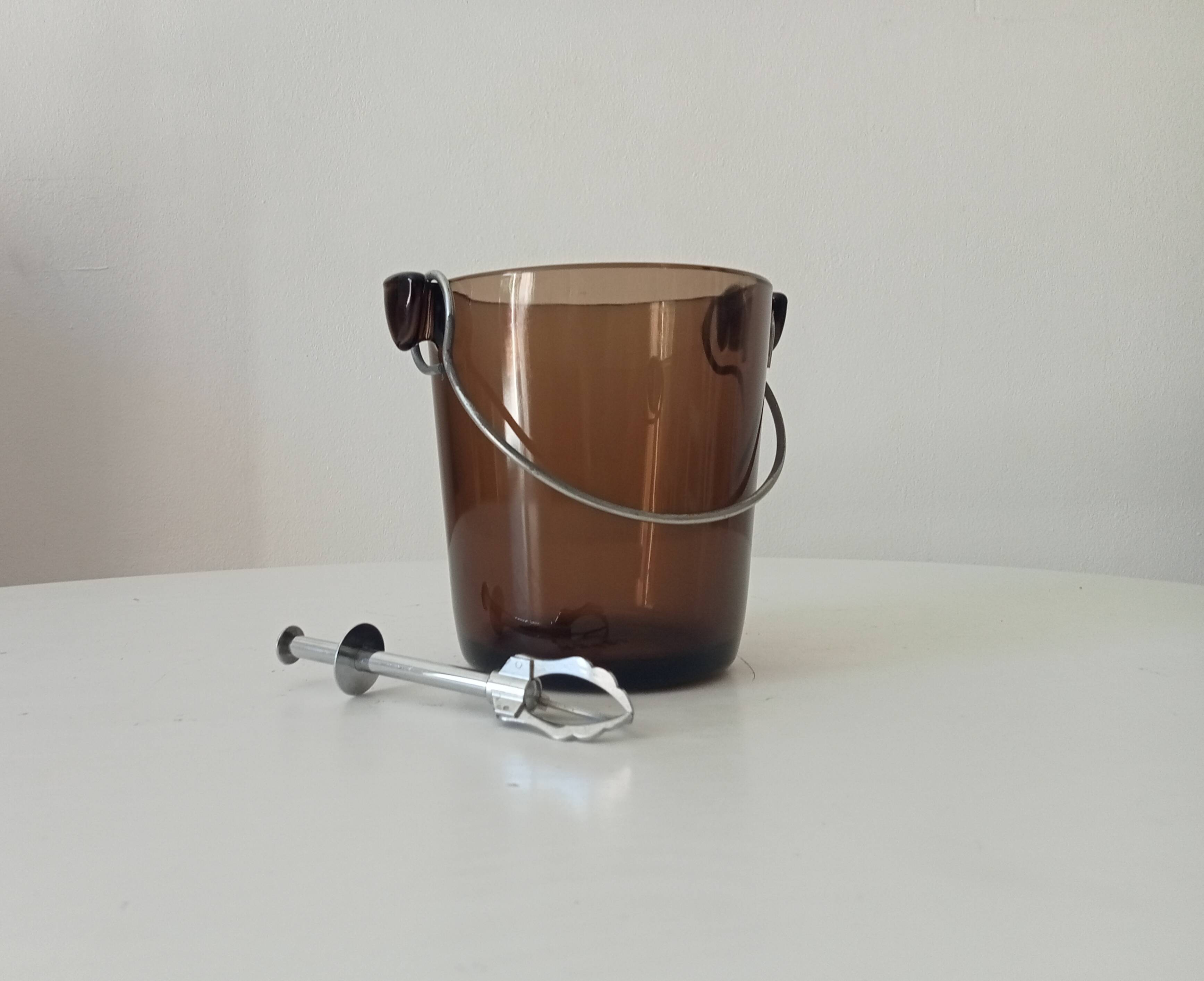 Vintage 1970s ice bucket and tongs.