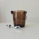 Vintage 1970s ice bucket and tongs.
