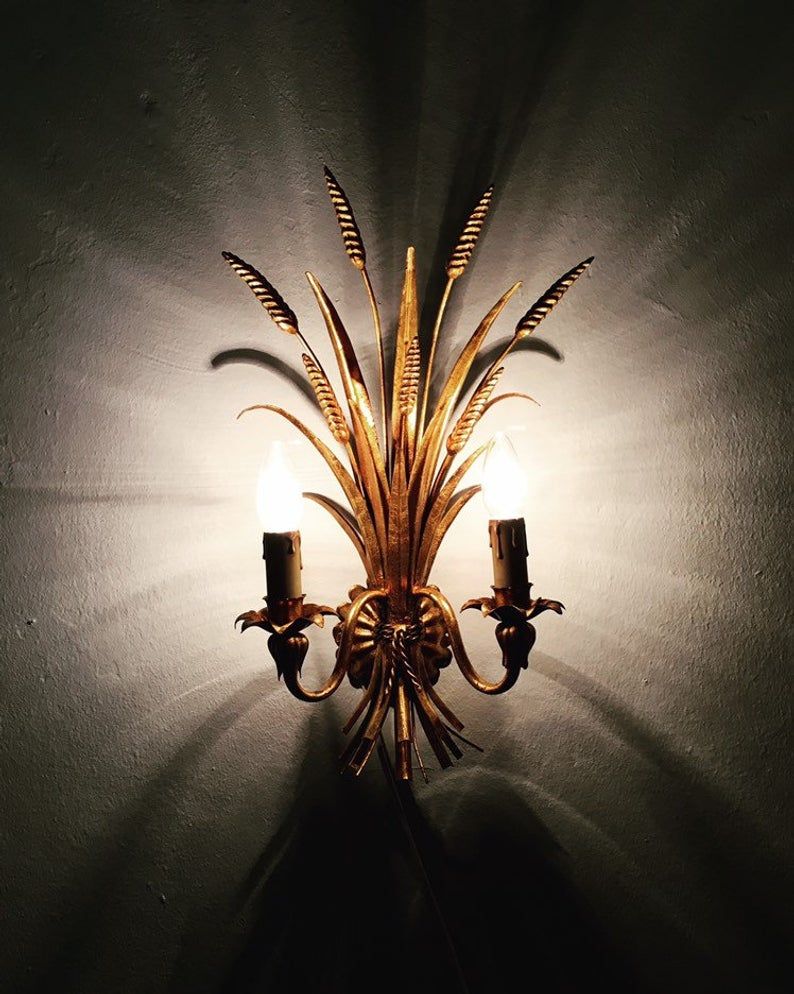 Pair of Italian Hollywood Regency metal wall lamps by Hans Kogl
