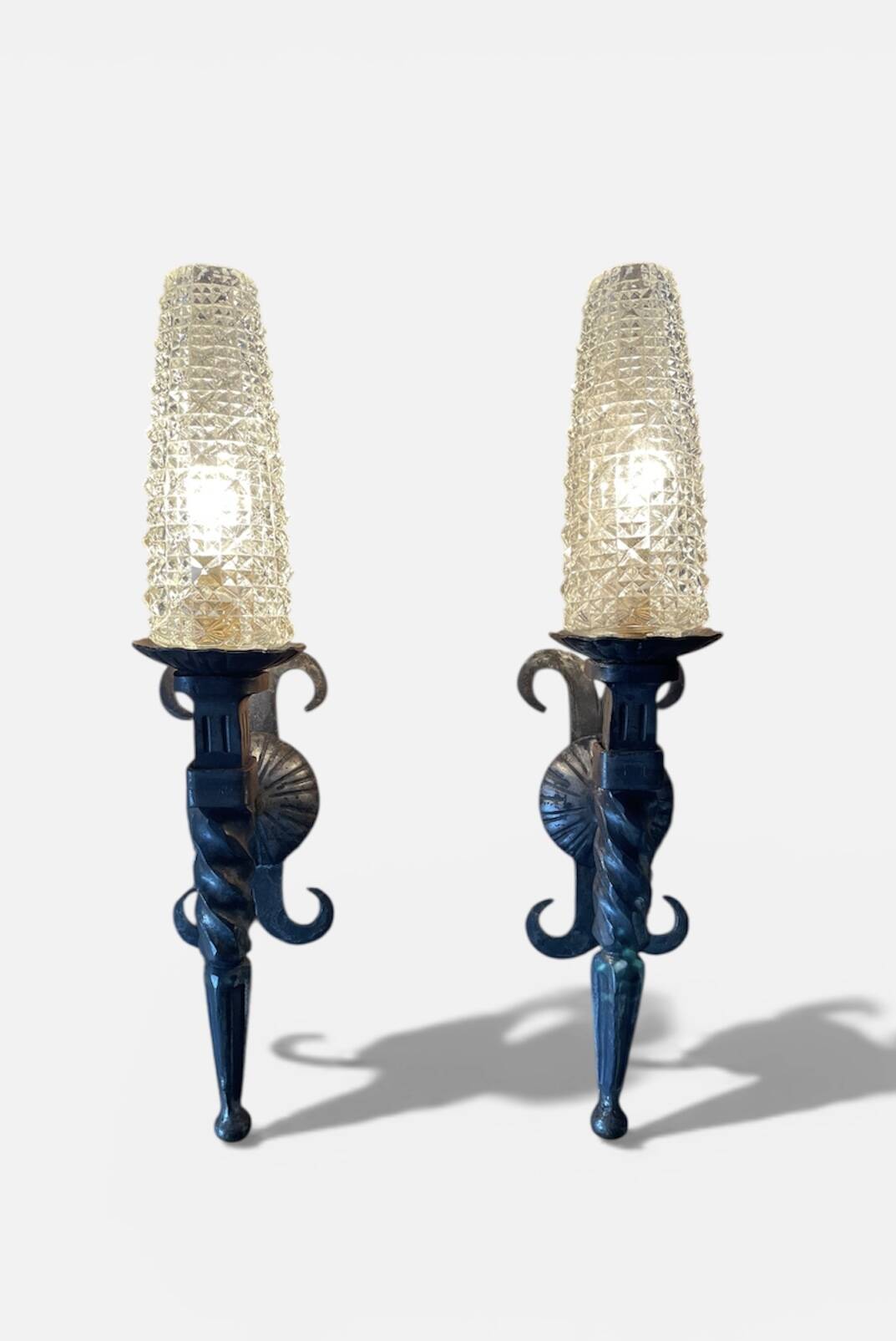 Pair of brutalist wall sconces in wrought iron