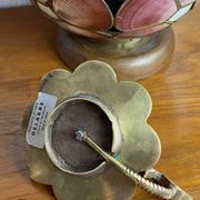 Handheld candlestick in bronze, card game decoration