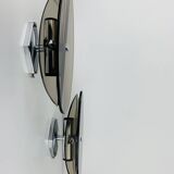 Pair of smoked glass and chrome wall lights from the 1970s.