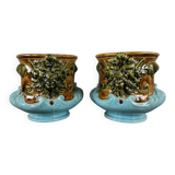 Paire de cache-pots en barbotine à décor de mascarons, XIXe siècle