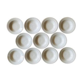 Hollow plates in vintage speckled sandstone