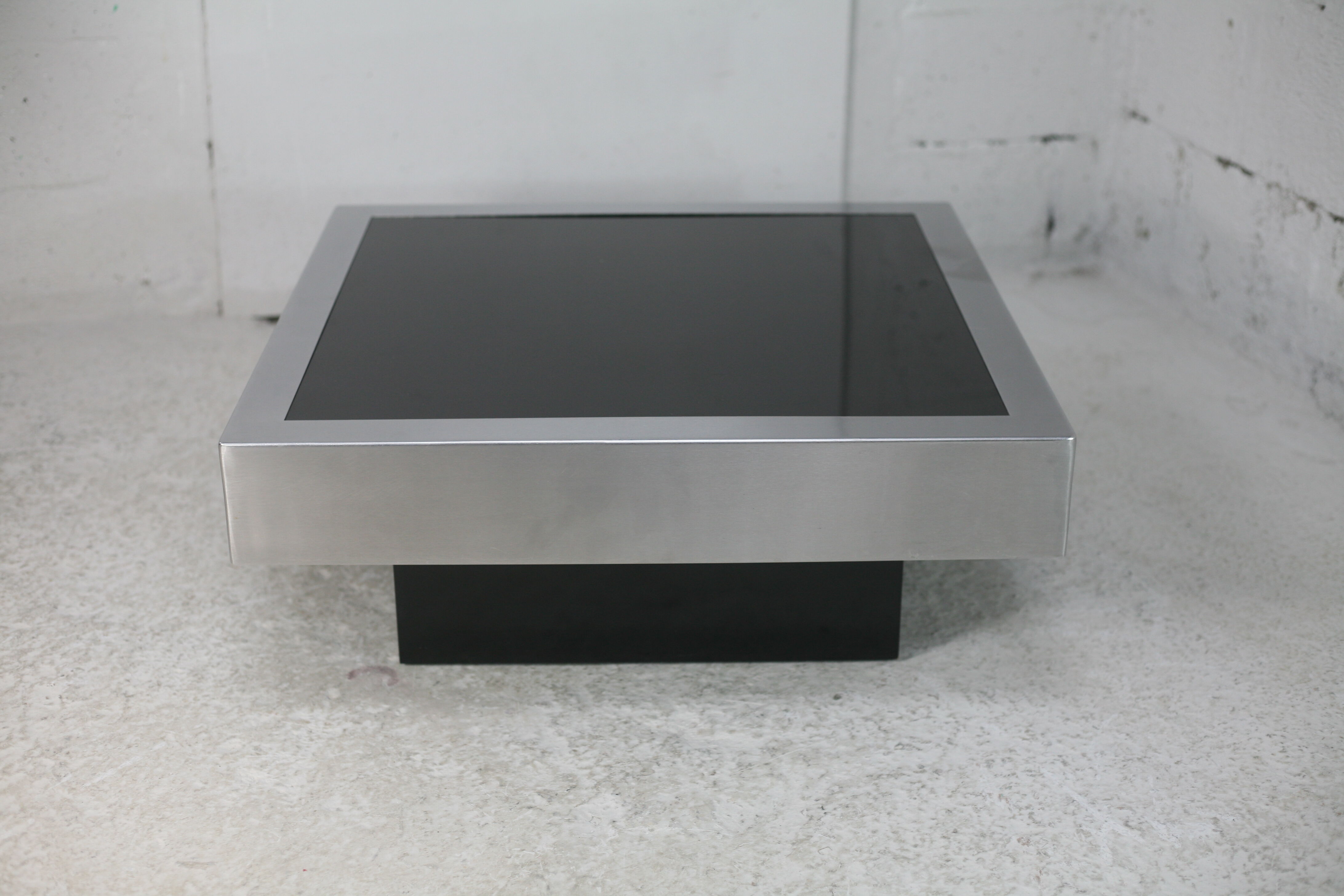 Coffee table in steel and black glass. France, circa 1970