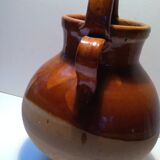 Old glazed earth jug