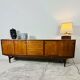 Large sideboard by Johannes Andersen in teak, 240 cm.