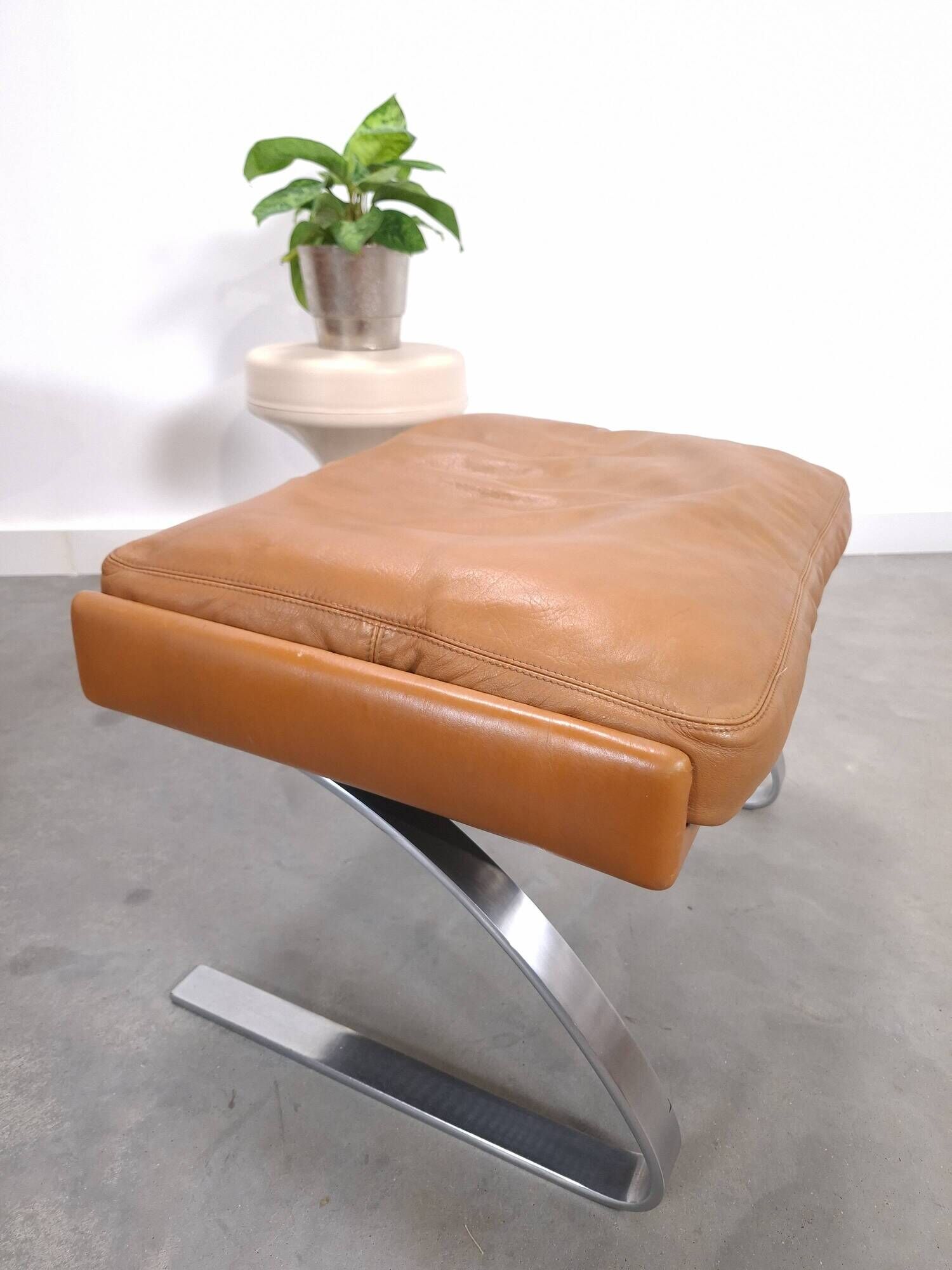 Vintage COR Swing armchair with ottoman, Reinhold Adolf, cognac leather
