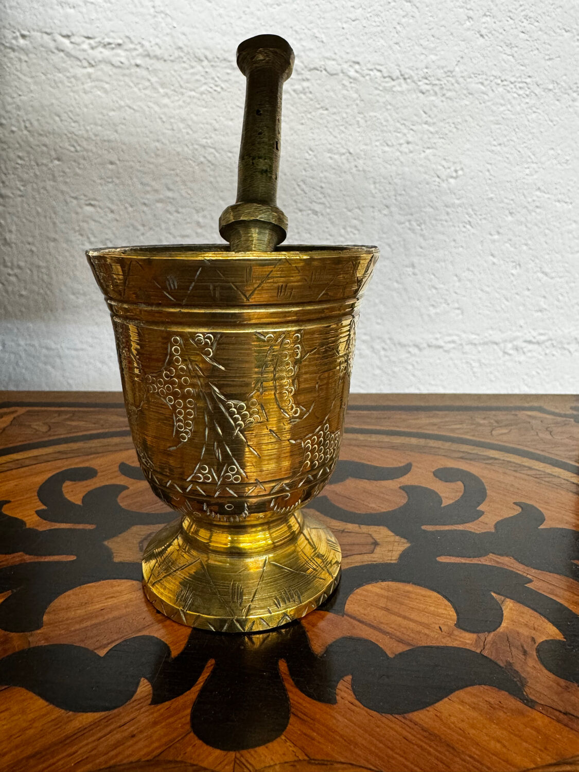 Golden brass mortar and pestle
