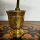 Golden brass mortar and pestle