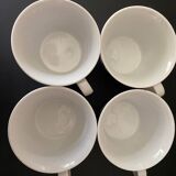 4 fine white porcelain cups with fine flower decoration