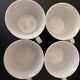 4 fine white porcelain cups with fine flower decoration