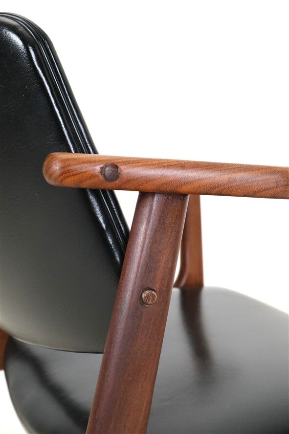 Mid Century Danish Modern teak armchair in the style of Arne Vodder