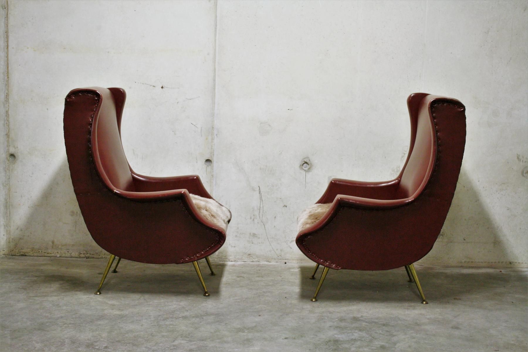 Pair of armchairs vintage with feet brass Italy 1960 s