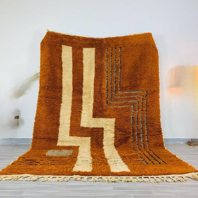 Modern Moroccan rug in rust wool with cream lines 150/250 cm