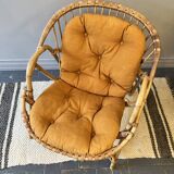 Rattan basket armchair with its cushion