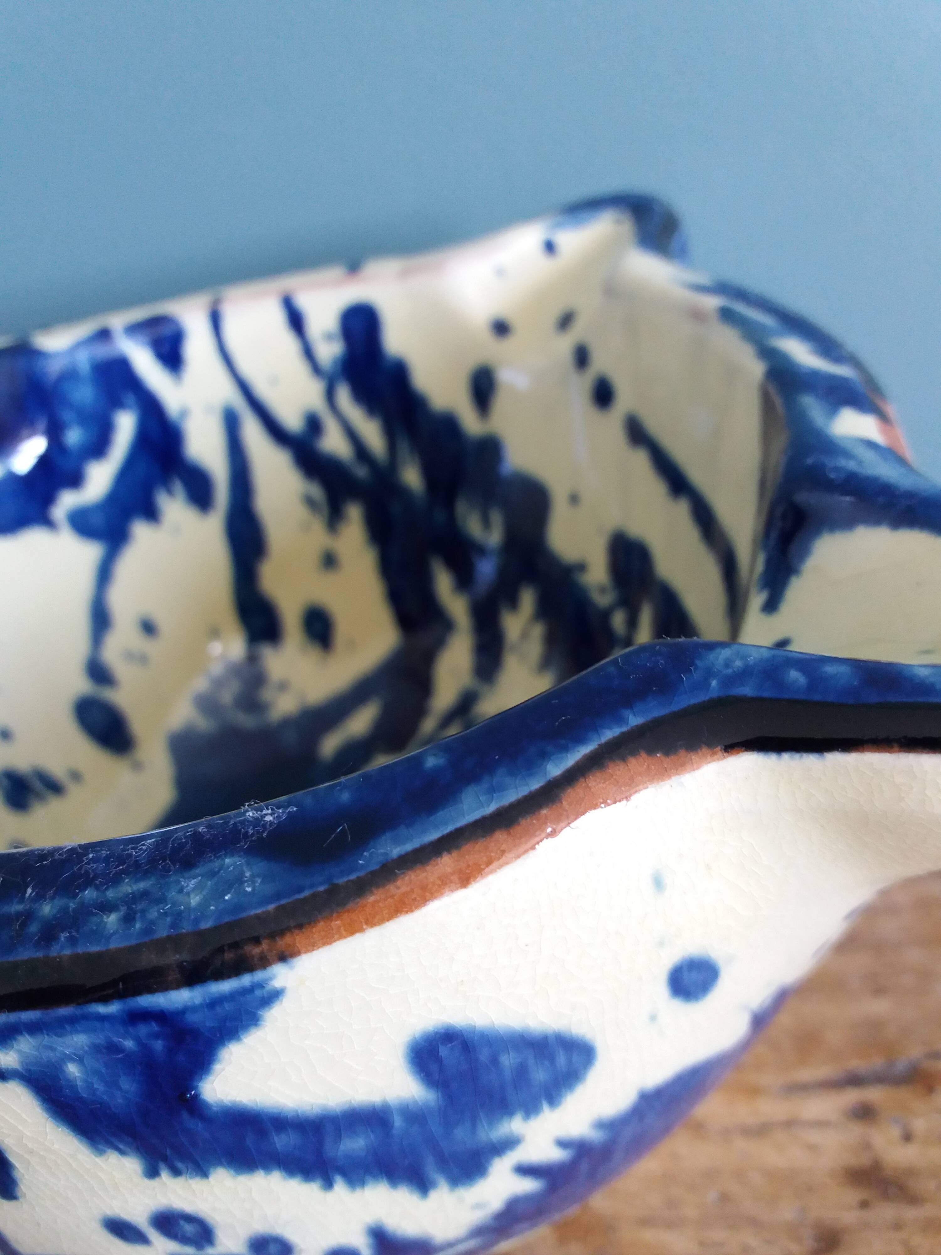 Glazed terracotta mortar and wooden pestle