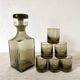 Smoked glass carafe and matching glasses, 1970s