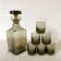 Smoked glass carafe and matching glasses, 1970s