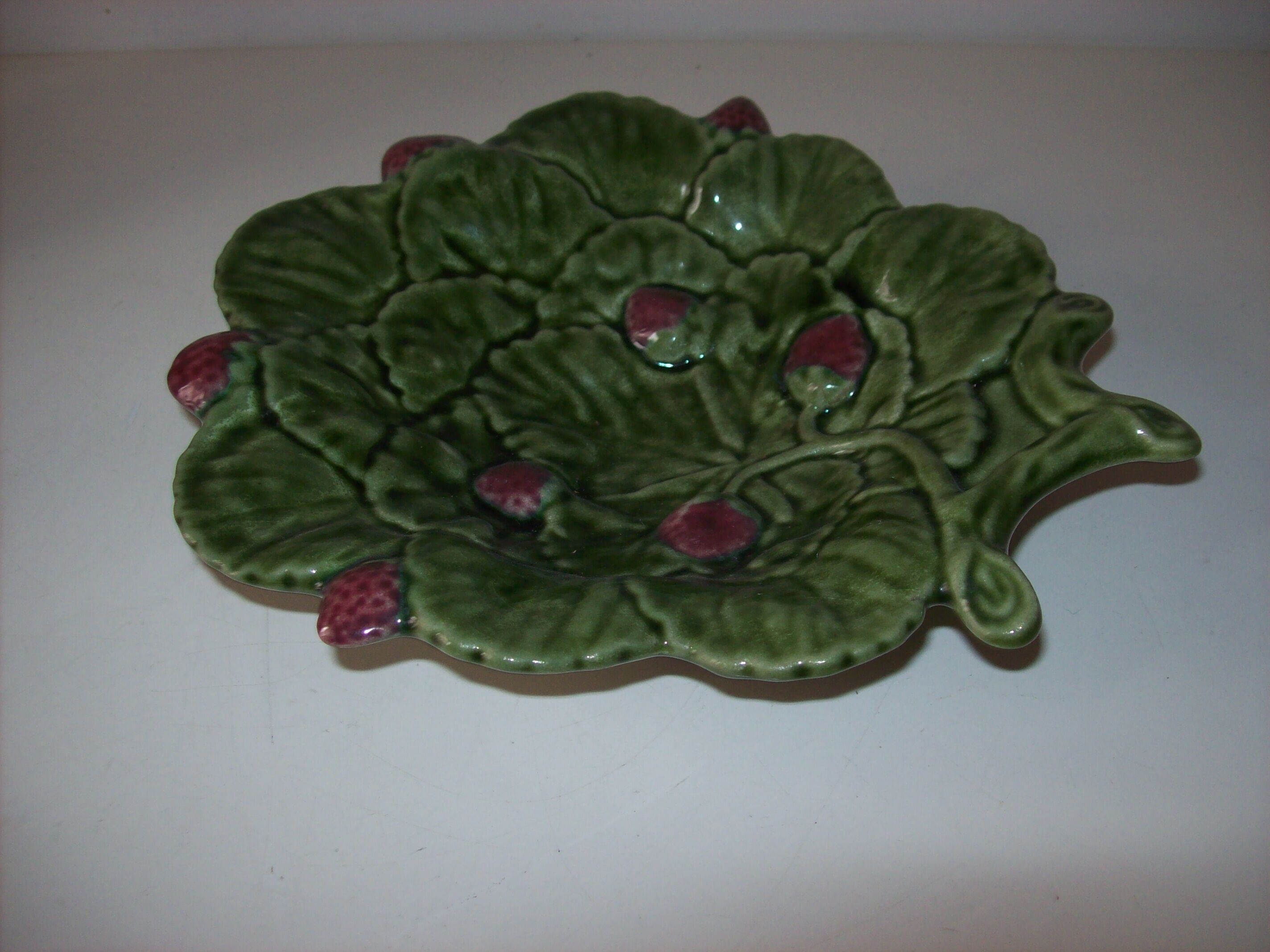 Tidy with raspberry decoration