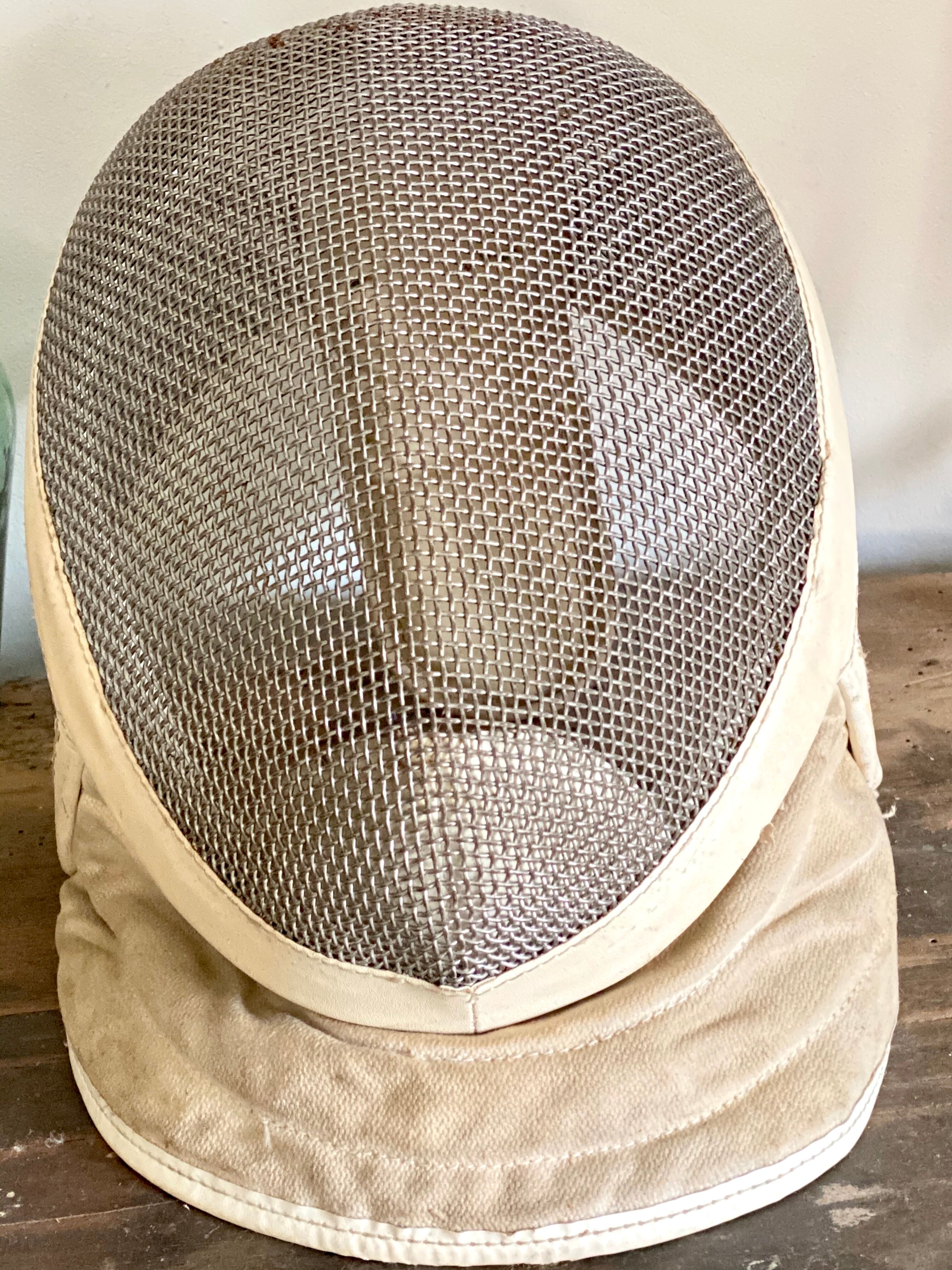 Old fencing mask set and its foil