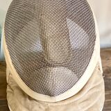 Old fencing mask set and its foil