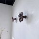 Pair of wooden flower wall lights from the 1970s.