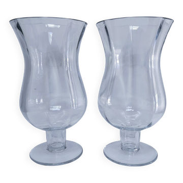 Pair of tall clear glass candlesticks from the early 20th century