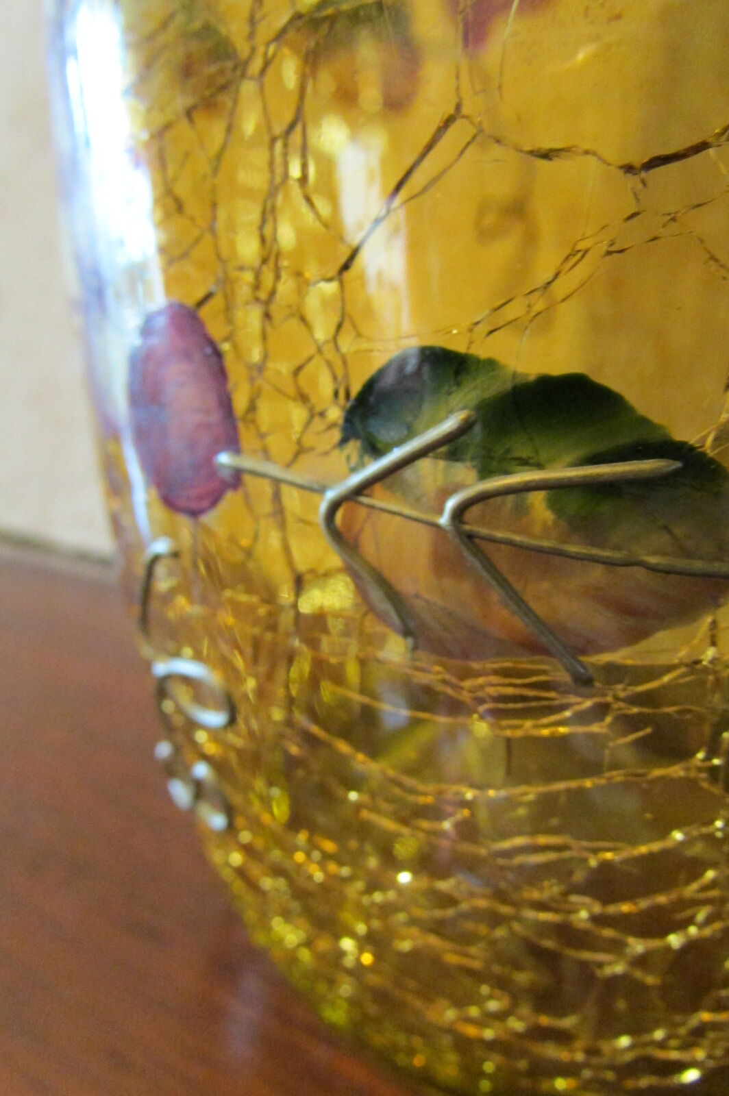 Yellow glass vase, cracked paint, grape motifs