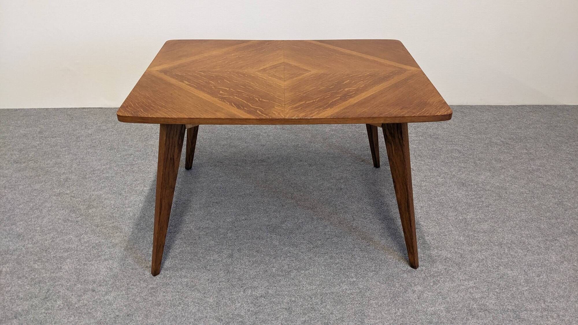 Modernist coffee or side table in oak marquetry, France 1960.