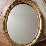 Oval mirror in wood and stucco 33x49cm