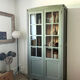 Art Deco library in earthy green