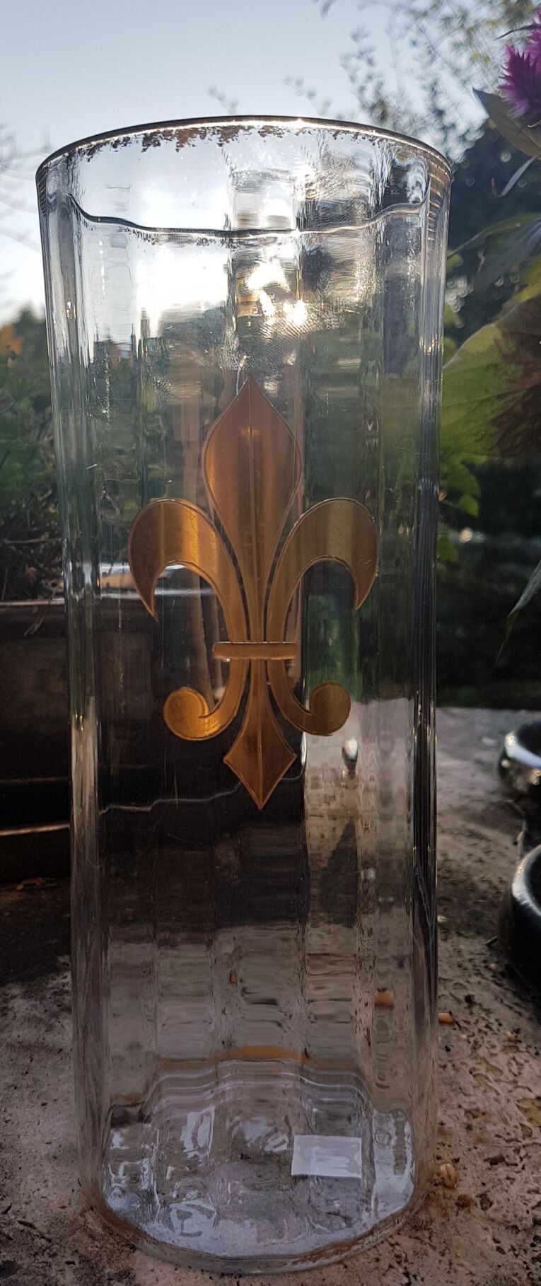 Faceted crystal vase decorated with lily flower