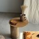 Small circular teak monoxyle cutting board with handle 22 x 13.