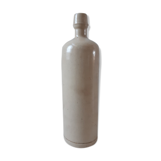 Bottle in ancient artisanal sandstone