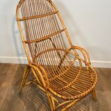Pair of designer armchairs in rattan