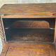 Small storage cabinet in carved oak – circa 1930