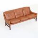 Canapé scandinave trois places en palissandre et cuir marron Danemark 1960