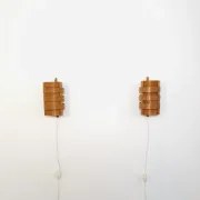 Wall sconces in pine veneer by Hans-Agne Jakobsson for Ab Ellysett, Sweden, 1960s.