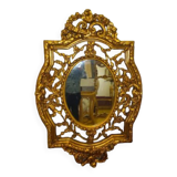 Oval gilded mirror