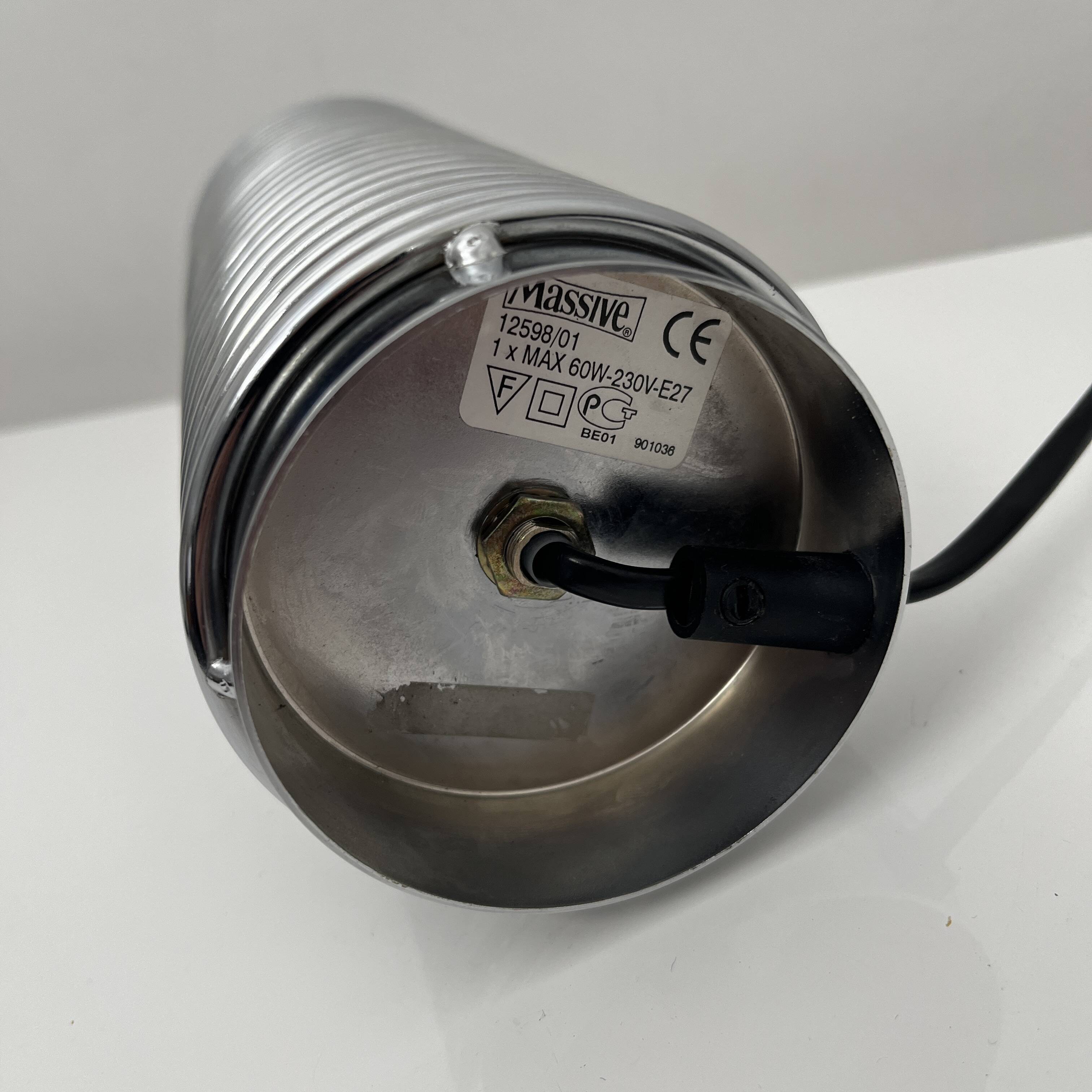 Massive chrome spring lamp