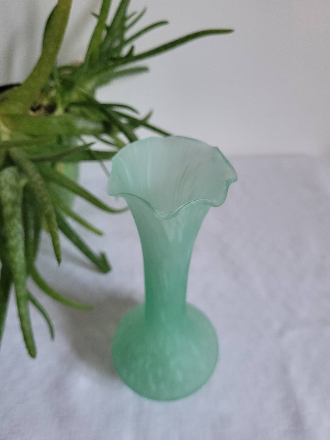 Green and white glass paste single flower vase